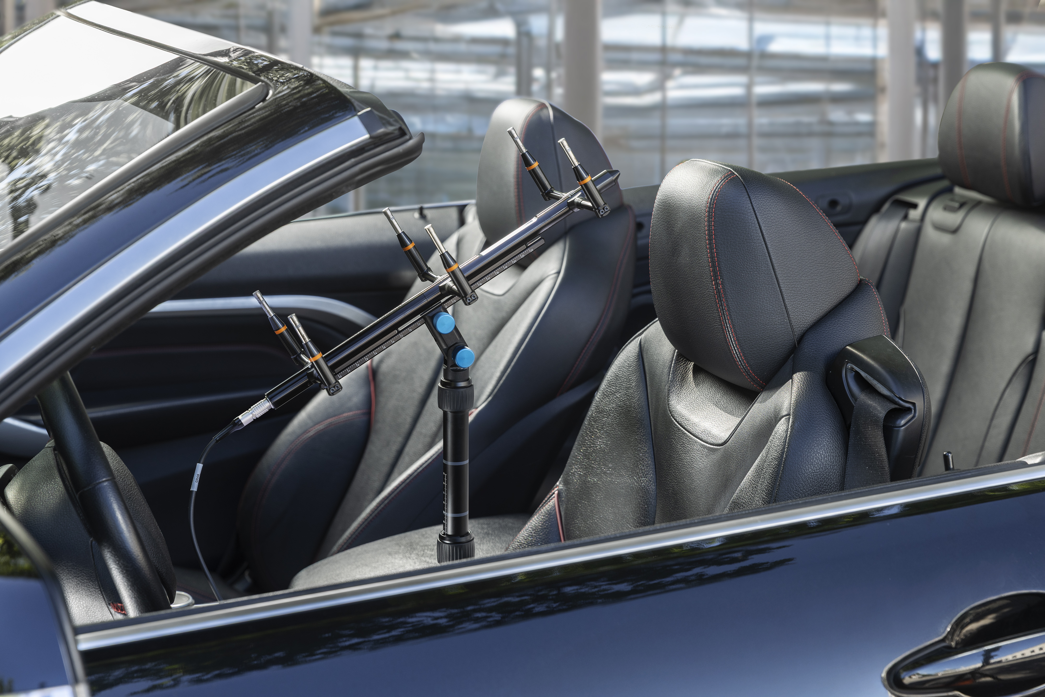 Six-microphone layout of the AES Automotive Array Microphone simulating listener ear positions